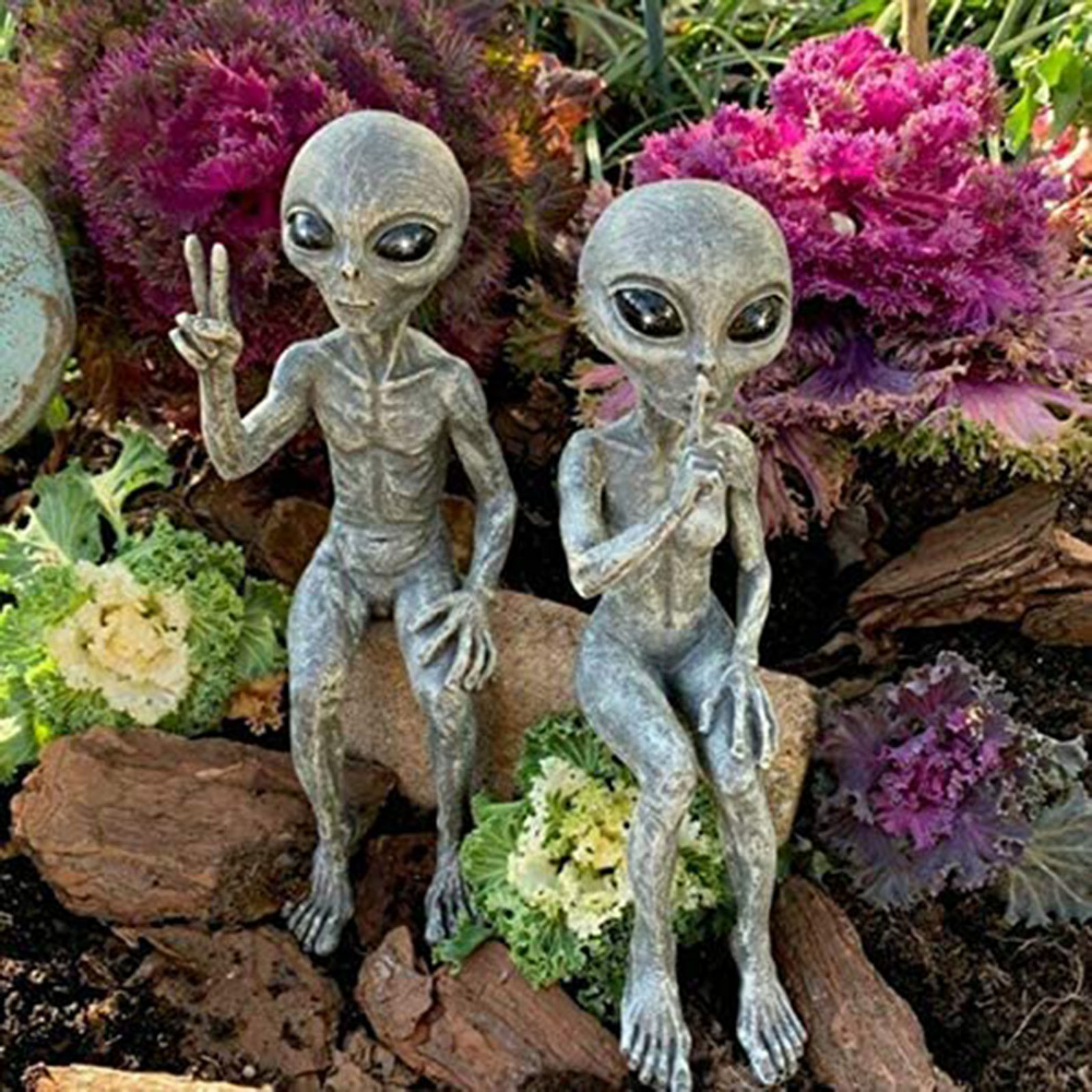 Alien statue garden figurine set for indoor and outdoor decor, featuring detailed extraterrestrial figures for yard or home display.