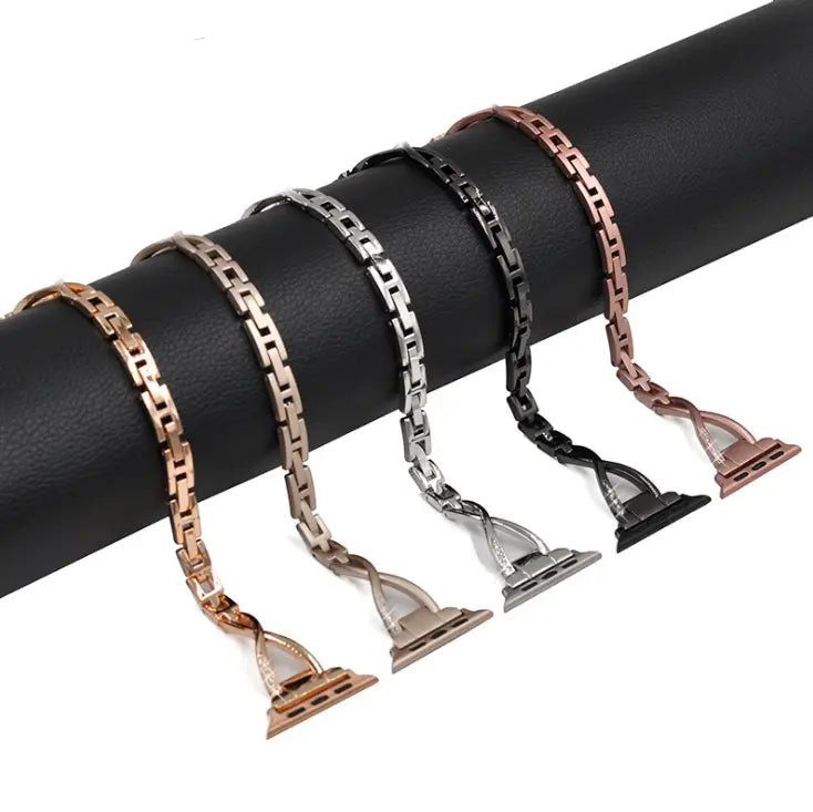 Stainless steel Apple Watch band with diamond accents, X-Type design, showcasing a sleek and luxurious look.