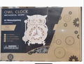 DIY wooden mechanical owl clock model for home decor, featuring intricate gears and natural wood finish.