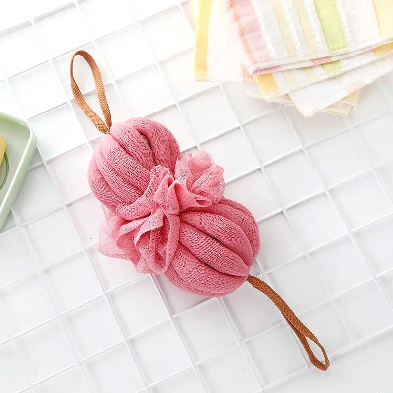 Large Japanese bath towel and exfoliating bath ball, soft fabric and textured ball for gentle cleansing and relaxing bath experience.