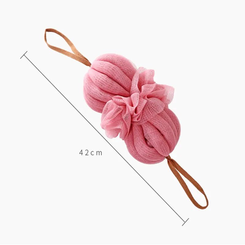Large Japanese bath towel and exfoliating bath ball, soft cotton towel with textured exfoliating ball for gentle skincare.