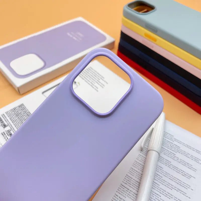 Liquid silicone case for iPhone 14 Pro Max with MagSafe, shown in a sleek, smooth design fitting the phone securely.