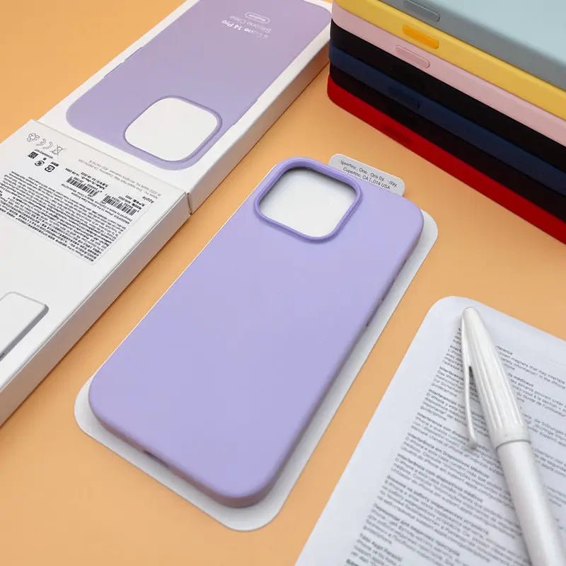 Liquid silicone case for iPhone 14 Pro Max with MagSafe, soft-touch protective cover in pastel pink with precise cutouts.