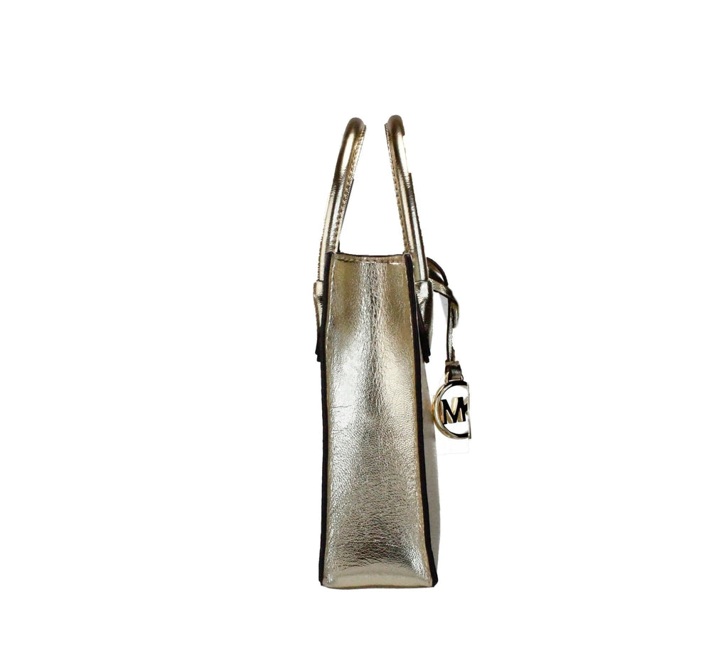 Michael Kors Mercer XS Pale Gold North South Crossbody Bag with gold-tone hardware and adjustable strap.