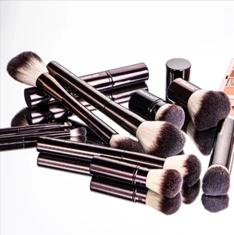 Set of multifunctional makeup brushes from My Store, including various applicators for eyes, face, and lips.