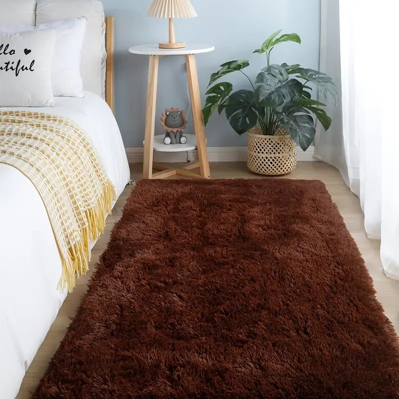Soft square plush rug and decorative throw blanket in a 47x63 inch size, featuring a cozy, plush texture and stylish design.