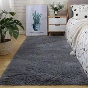 Soft square plush rug and decorative throw blanket in 47x63 inches, featuring cozy, plush fabric and stylish design for home decor.