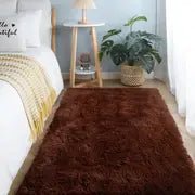 Soft square plush rug and decorative throw blanket in 47x63 inches, featuring a cozy, plush texture and stylish design.