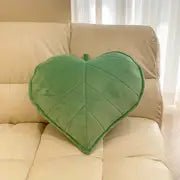 Solid color leaf-shaped pillow for home decor, featuring a soft fabric and natural leaf design from My Store.