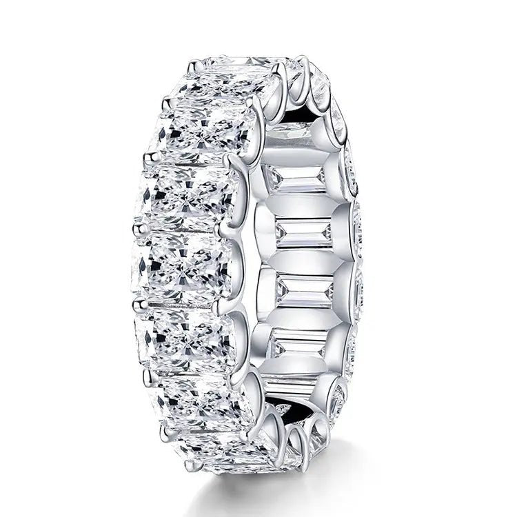 Sterling silver ring featuring a high carbon diamond simulant, showcasing a polished band with a sparkling stone centerpiece.