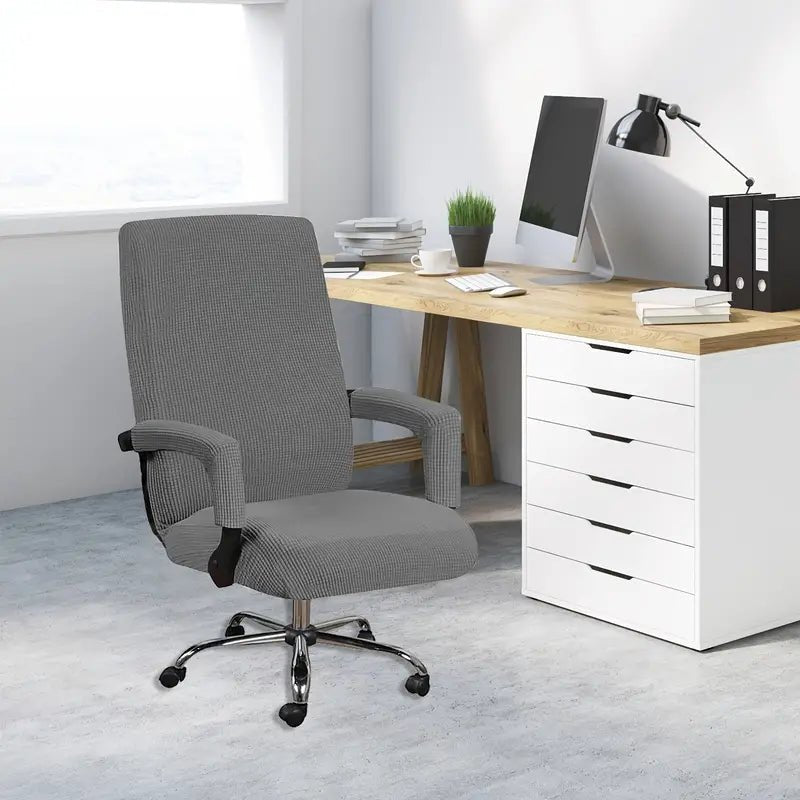 Stretchable non-slip chair cover for home office, made of soft fabric, fits standard chairs, provides a snug, secure fit.