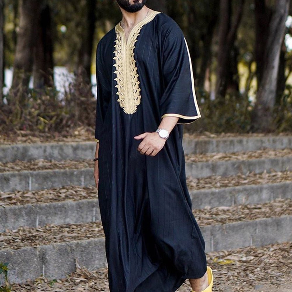Black men's long Muslim robe shirt with stylish design, featuring a comfortable fit and elegant appearance.