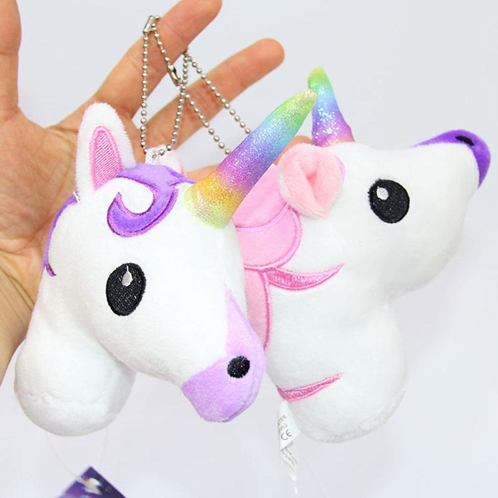 Colorful unicorn plush ornament with rainbow mane and horse keychain design, perfect for decorating or accessorizing.