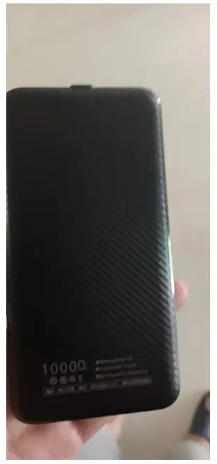 USB heated winter jacket by My Store with visible zipper, warmth panels, and a sleek black design for cold weather comfort.