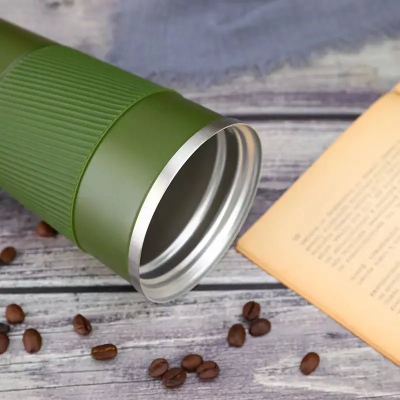 Stainless steel vacuum insulated travel mug with lid, designed for hot and cold beverages, featuring a sleek, durable finish.