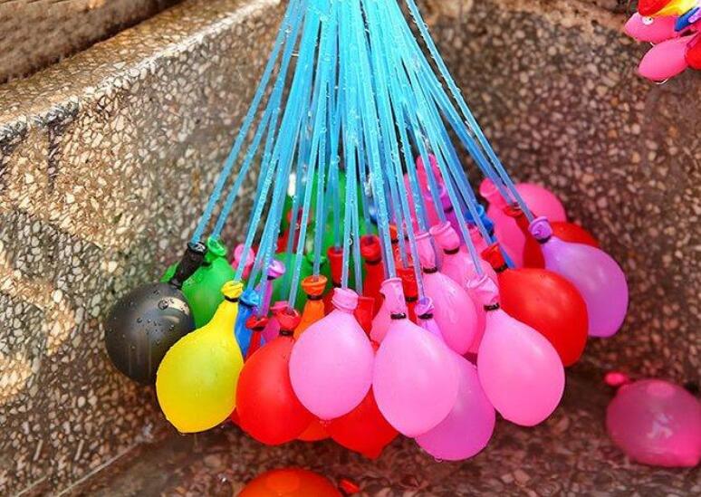 Colorful water balloons with quick fill feature from My Store, ready for summer water fights and outdoor fun.