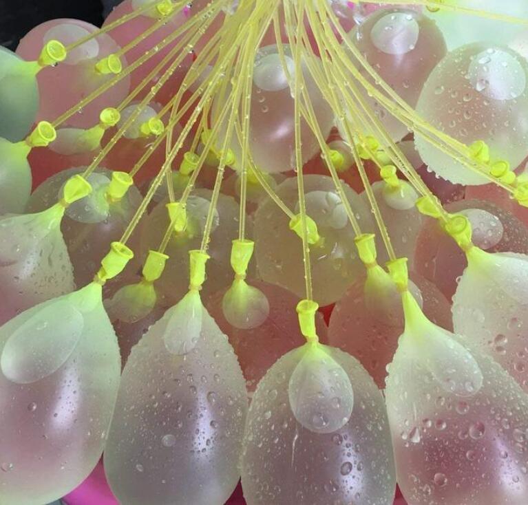 Colorful water balloons with quick fill feature, perfect for outdoor summer fun and water fights.