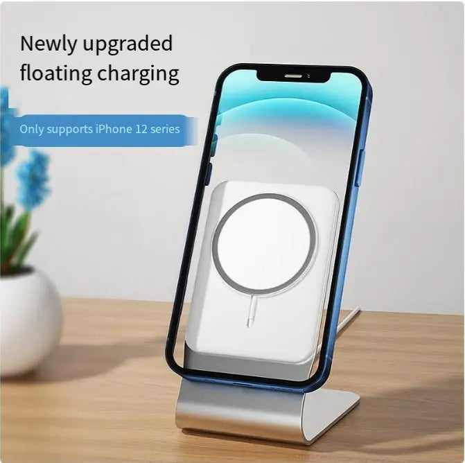 Wireless charging desktop stand for mobile phones, with sleek design and integrated charging pad for convenient phone charging.