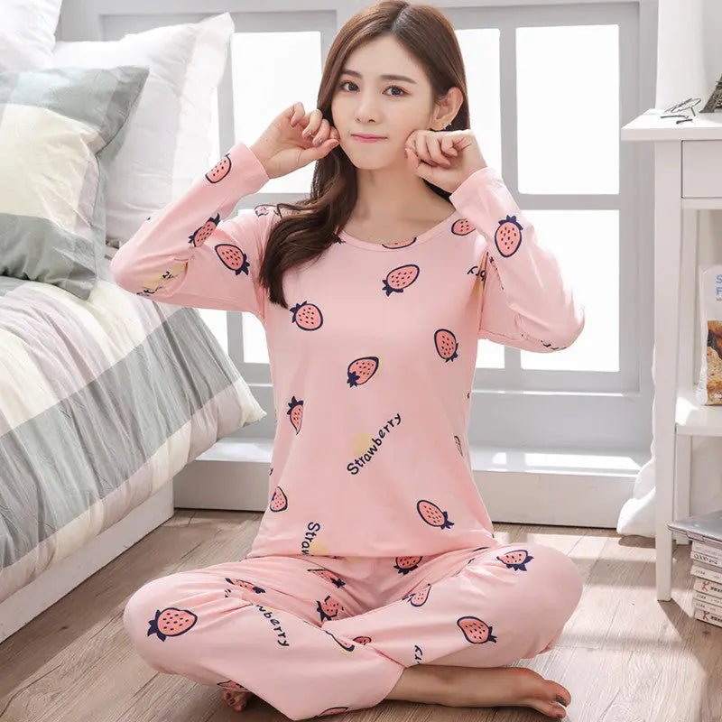 Women’s long-sleeved pajama set with a cute design, featuring soft fabric and comfortable fit for cozy nights.