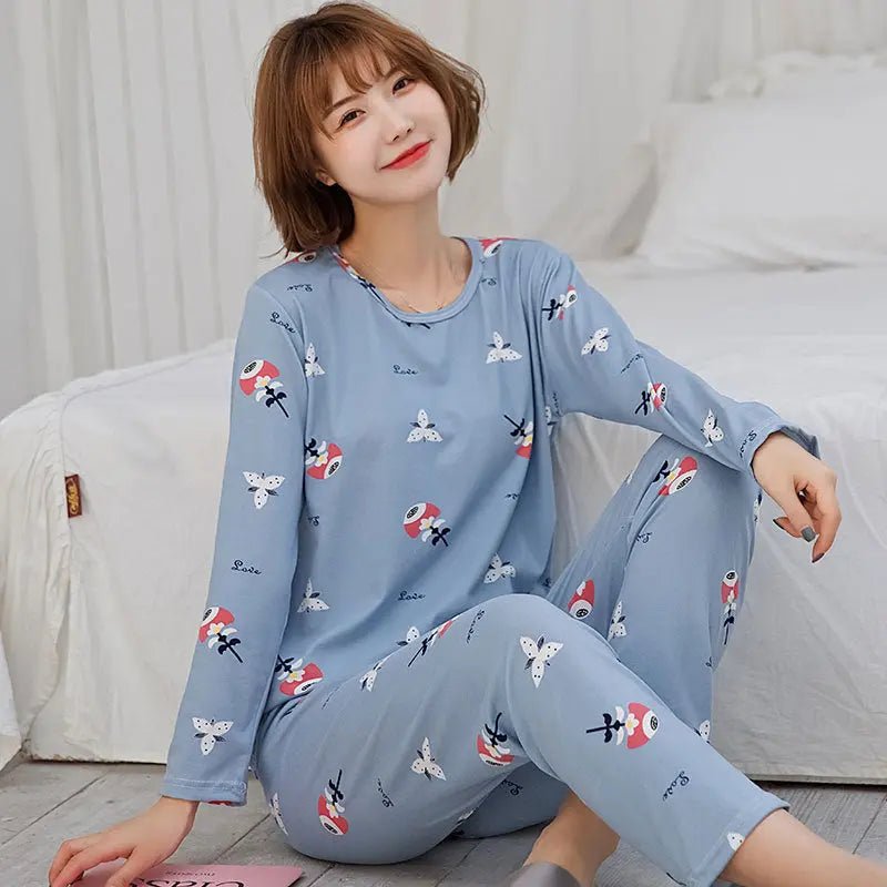 Women's long-sleeved pajama set with a cute design, soft fabric, and comfortable fit for cozy nights.